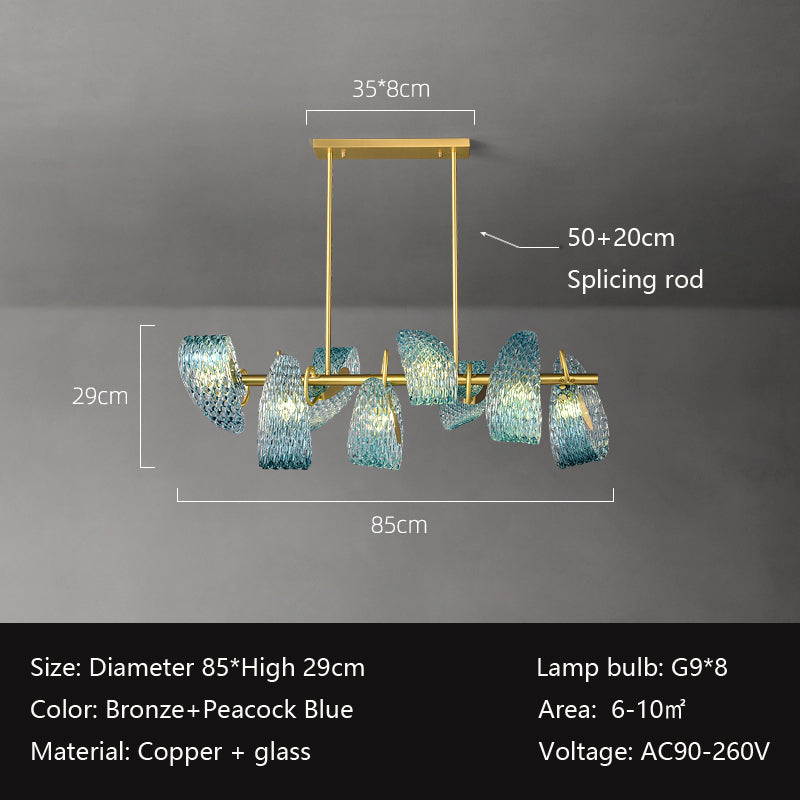A chandelier with a bronze and peacock blue design, featuring intertwined glass elements. Dimensions are 85cm wide and 29cm high. It uses eight G9 bulbs, suitable for areas 6-10m². Voltage ranges from AC90-260V.