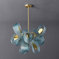 A contemporary living room featuring a large blue chandelier that adds elegance to the space.
