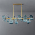 A modern chandelier featuring a brass lamp body with an elegant gold finish and multiple handmade peacock blue glass lampshades. The artistic design creates a dynamic and luxurious appearance, perfect for dining rooms, adding a touch of sophistication and warmth to the space.