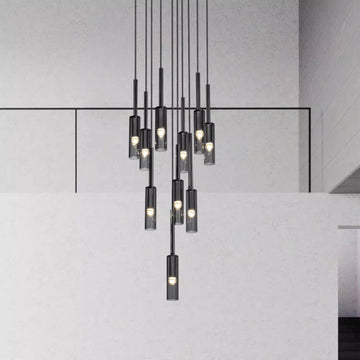 A contemporary pendant light made of mirror glass, suspended from the ceiling, adding a stylish touch to the interior space.