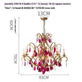 An image depicting a chandelier made of red glass, highlighting its unique dimensions and artistic craftsmanship.