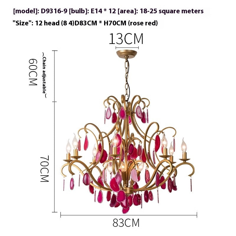 An image depicting a chandelier made of red glass, highlighting its unique dimensions and artistic craftsmanship.