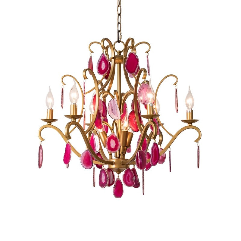 A stunning chandelier adorned with delicate pink crystals, elegantly suspended from the ceiling, illuminating the space below.