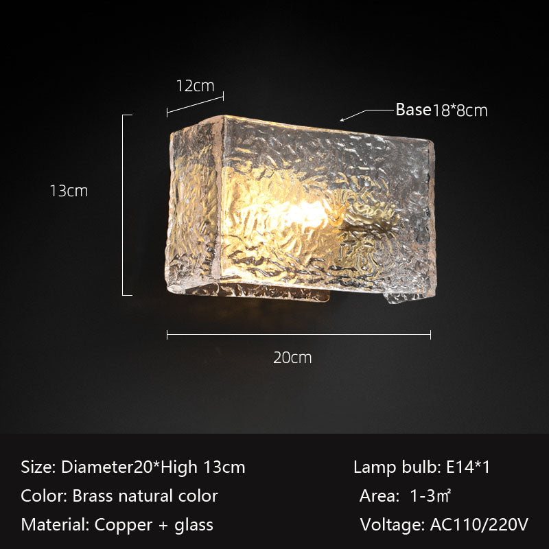 Illuminated wall-mounted lamp with textured glass shade, dimensions marked, details on specs below.
