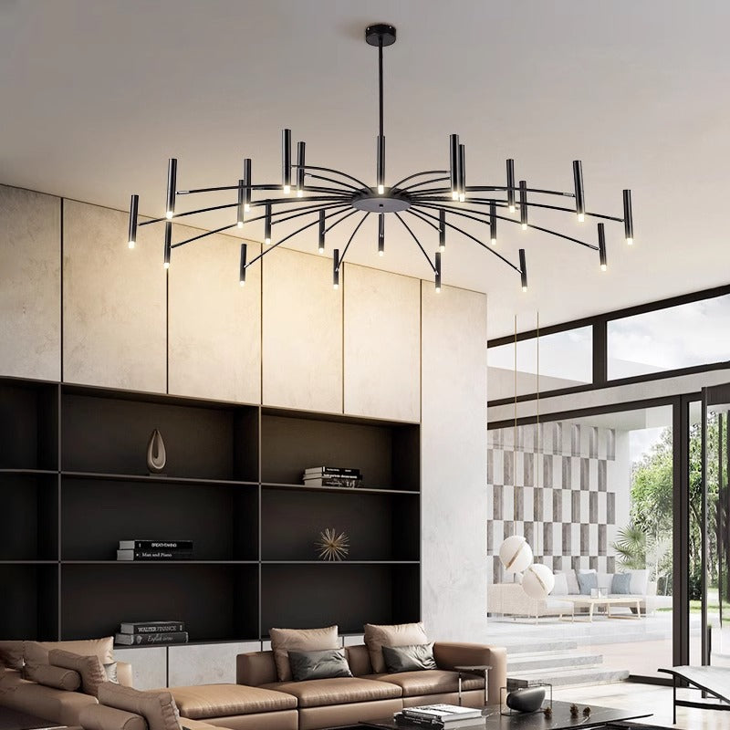 Modern chandelier with multiple rods and lights above a stylish living room interior.