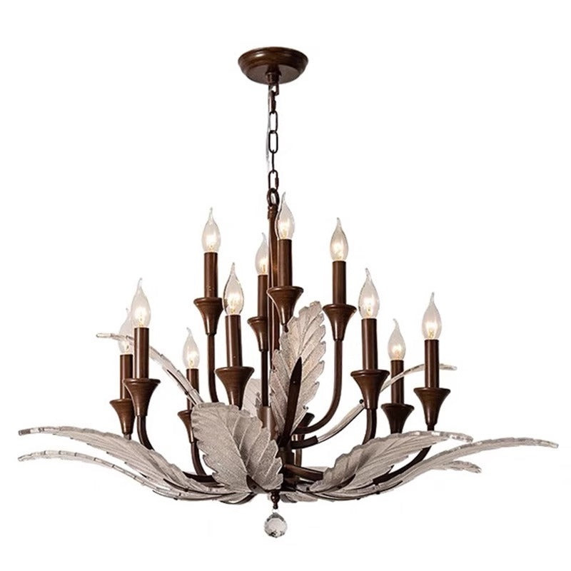 Elegant chandelier with bronze metal accents, candle-style lights, and decorative glass leaves, suspended from a chain.