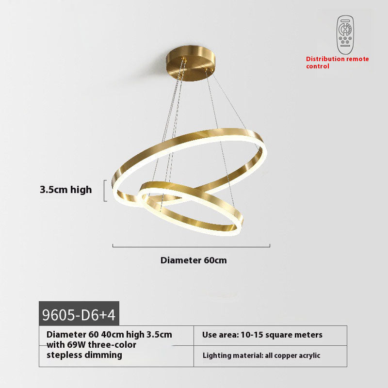 Modern pendant light design showcasing intertwined gold rings, perfect for enhancing interior aesthetics.