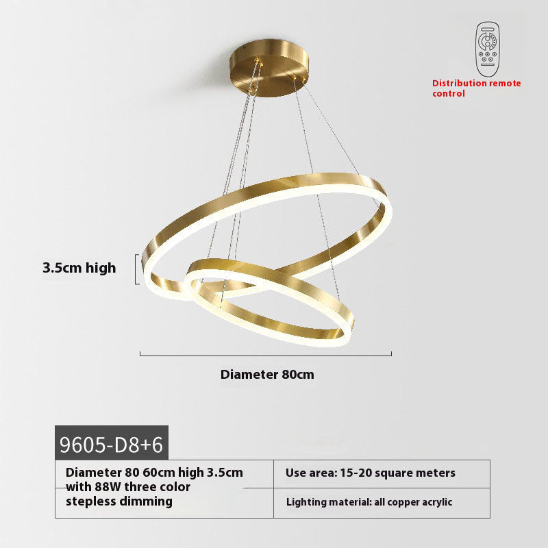 Stylish pendant light with a sleek design, highlighted by shimmering gold rings for a luxurious ambiance.