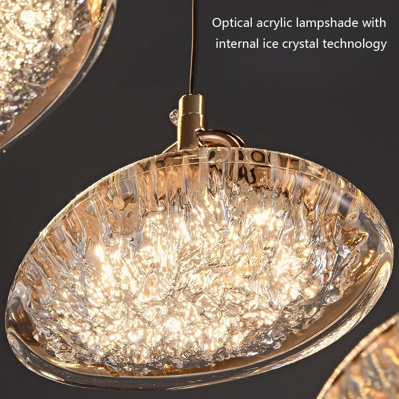 Illuminated gold-colored textured lampshade with a crystal-like appearance.