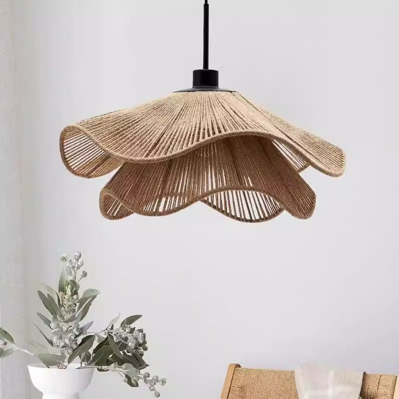 A contemporary pendant light featuring a stylish woven shade, adding elegance to any modern interior space.