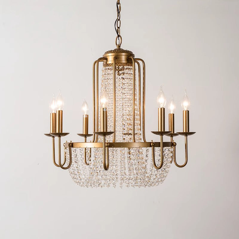 An elegant brass chandelier with five lights, adding a touch of sophistication to the room's decor.