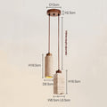 Two pendant lights hang from a 12cm circular base, echoing the Travertine Restaurant Chandeliers design. Featuring cylindrical and rectangular shapes, they stand 18.5cm tall with 170cm adjustable cords. Dimmable LED bulbs enhance ambiance.