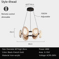 The round chandelier features six disc-shaped lights, smart dimming via remote control, and an adjustable height up to 150 cm. Crafted from black and French gold iron with acrylic, it operates at 48W for areas of 6-10m².