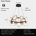 The Round Chandelier Style-8head features eight oval rings, remote-controlled smart dimming, and adjustable height up to 150CM. Crafted from iron and acrylic with a 55cm diameter, it suits spaces of 10-15㎡.
