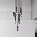 A contemporary pendant light made of mirror glass, suspended from the ceiling, adding a stylish touch to the interior space.