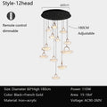 Modern chandelier with 12 adjustable hanging lights, remote control, black and gold iron structure, acrylic shades.