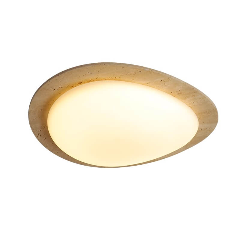 The Wabi-Sabi Travertine LED Ceiling Light features an oval soft-glow white diffuser with a travertine-inspired border, reflecting a subtle Wabi-Sabi aesthetic for modern interiors.