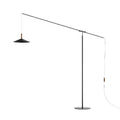 The Velluto Floor Lamp features minimalist design with a sleek horizontal arm, conical shade, and circular base. It offers adjustable lighting in an elegant black and brass color scheme.