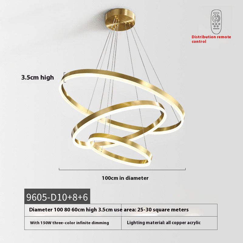 Chic pendant light adorned with gold rings, ideal for illuminating and elevating modern living spaces.