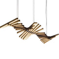 The Fishbone Wave Chandelier features an abstract, spiral design with cylindrical elements emitting a warm glow. Suspended by thin cables, its twisting pattern allows customizable lighting to match any ambiance.